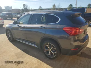 2016 BMW X1 xDrive28i z VIN WBXHT3Z30G4A47563, wystawiony jako Copart lot #50252555 z przebiegiem 99 975 mil mil oraz Szkoda całkowita • Salvage title. Historia ofert i sprzedaży dostępna na DreamBid. Obrazek 2.