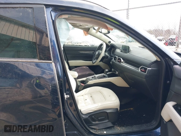 2018 Mazda CX-5 Grand Touring with VIN JM3KFADM1J1439544, listed as a IAAI auction lot 41891134 with 54,132 mi miles and . Bid and sale history available at DreamBid. Image 5.