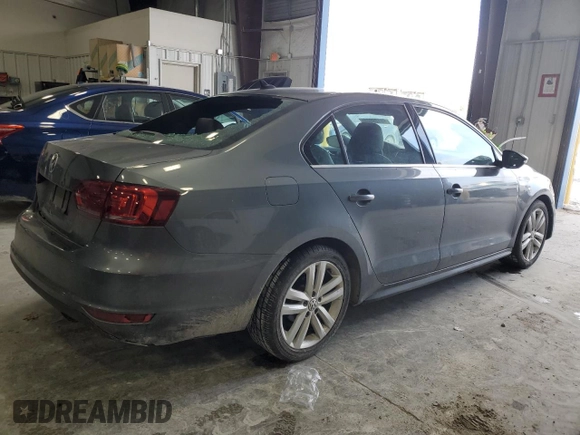 2014 Volkswagen Jetta GLI z VIN 3VW4T7AJ6EM398115, wystawiony jako Copart lot #89179925 z przebiegiem 81 264 mil mil oraz Szkoda całkowita • Salvage title. Historia ofert i sprzedaży dostępna na DreamBid. Obrazek 3.