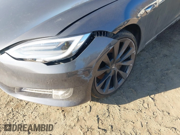 2019 Tesla Model S 75D with VIN 5YJSA1E2XKF331744, listed as a IAAI auction lot 41483173 with Not provided miles and . Bid and sale history available at DreamBid. Image 6.