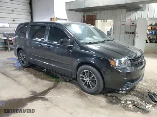 2017 Dodge Grand Caravan SE with VIN 2C4RDGBG6HR652007, listed as a Copart auction lot 52857675 with 131,003 mi miles and Salvage Title. Bid and sale history available at carsss.com. Image 4.