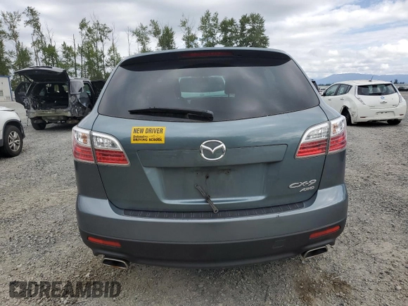 2012 Mazda CX-9 Touring z VIN JM3TB3CV8C0352576, wystawiony jako Copart lot #57489975 z przebiegiem 141 801 mil mil oraz Szkody całkowita. Historia ofert i sprzedaży dostępna na DreamBid. Obrazek 6.