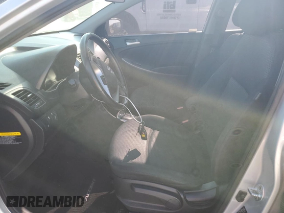 2016 Hyundai Accent Sport with VIN KMHCU5AE1GU237572, listed as a Copart auction lot 69176884 with 114,727 mi miles and Salvage Title. Bid and sale history available at carsss.com. Image 7.