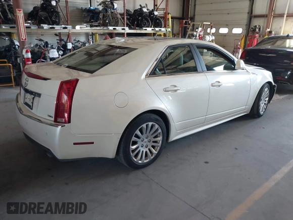 2010 Cadillac CTS Premium with VIN 1G6DS5EV8A0142811, listed as a IAAI auction lot 42562666 with 177,963 mi miles and . Bid and sale history available at DreamBid. Image 4.