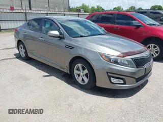 2015 Kia Optima LX z VIN 5XXGM4A71FG447627, wystawiony jako IAAI lot #42521156 z przebiegiem 104 576 mil mil oraz . Historia ofert i sprzedaży dostępna na DreamBid. Obrazek 1.
