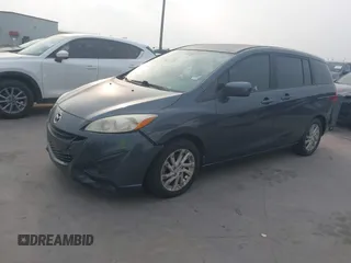 2012 Mazda 5 Sport with VIN JM1CW2BL6C0134921, listed as a IAAI auction lot 42290476 with 128,490 mi miles and . Bid and sale history available at DreamBid. Image 2.