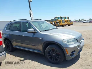 2013 BMW X5 xDrive50i with VIN 5UXZV8C56D0C15064, listed as a IAAI auction lot 42179213 with Not provided miles and . Bid and sale history available at DreamBid. Image 12.