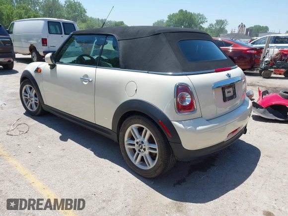 2012 MINI Convertible with VIN WMWZN3C51CT134646, listed as a IAAI auction lot 42252740 with 124,278 mi miles and . Bid and sale history available at DreamBid. Image 3.