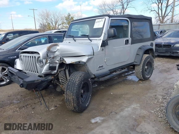 2005 Jeep Wrangler Unlimited with VIN 1J4FA44S25P340852, listed as a IAAI auction lot 41441671 with 139,302 mi miles. Bid and sale history available at carsss.com. Image 2.