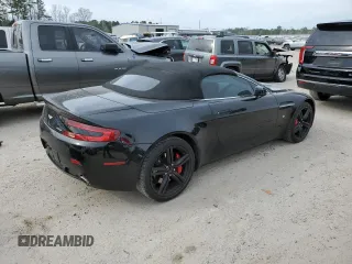 2009 Aston Martin Vantage z VIN SCFBF04CX9GD11942, wystawiony jako Copart lot #43771214 z przebiegiem 52 730 mil mil oraz . Historia ofert i sprzedaży dostępna na DreamBid. Obrazek 3.