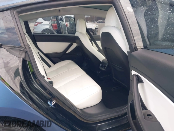 2018 Tesla Model 3 Long Range Battery with VIN 5YJ3E1EB9JF134958, listed as a IAAI auction lot 41980958 with 80,367 mi miles and . Bid and sale history available at DreamBid. Image 8.