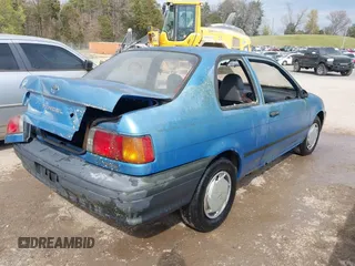 1992 Toyota Tercel z VIN JT2EL46B0N0239559, wystawiony jako IAAI lot #41890594 z przebiegiem 210 767 mil mil oraz . Historia ofert i sprzedaży dostępna na DreamBid. Obrazek 4.