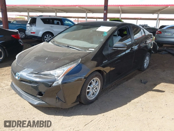 2016 Toyota Prius Two with VIN JTDKBRFUXG3503142, listed as a IAAI auction lot 42027700 with 185,319 mi miles. Bid and sale history available at carsss.com. Image 18.