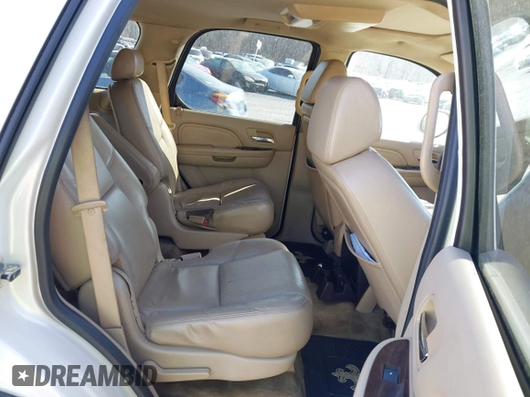 2009 Cadillac Escalade z VIN 1GYFK53219R121847, wystawiony jako IAAI lot #41818934 z przebiegiem 132 293 mil mil oraz . Historia ofert i sprzedaży dostępna na DreamBid. Obrazek 8.