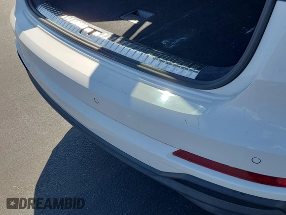 2023 Audi Q3 S line Premium with VIN WA1DECF34P1106228, listed as a IAAI auction lot 42734425 with 52,167 mi miles and . Bid and sale history available at DreamBid. Image 12.