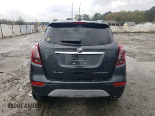 2018 Buick Encore Preferred with VIN KL4CJASBXJB669665, listed as a Copart auction lot 52557365 with 49,327 mi miles and Salvage Title. Bid and sale history available at DreamBid. Image 6.