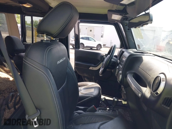 2017 Jeep Wrangler Unlimited Rubicon Recon with VIN 1C4BJWFG7HL525709, listed as a IAAI auction lot 42569577 with 119,560 mi miles and . Bid and sale history available at DreamBid. Image 5.