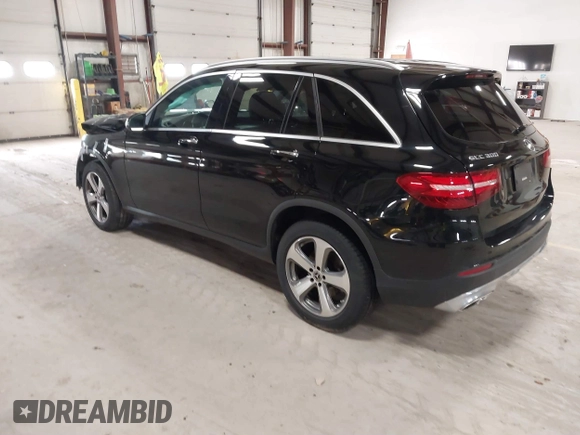 2019 Mercedes-Benz GLC with VIN WDC0G4KB1KV171258, listed as a IAAI auction lot 41895553 with 77,363 mi miles. Bid and sale history available at carsss.com. Image 3.