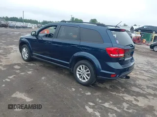2014 Dodge Journey SXT z VIN 3C4PDCBG8ET126938, wystawiony jako IAAI lot #42526536 z przebiegiem 142 664 mil mil oraz . Historia ofert i sprzedaży dostępna na DreamBid. Obrazek 3.