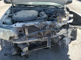 2015 Toyota Tacoma z VIN 3TMLU4EN3FM194963, wystawiony jako Copart lot #54074415 z przebiegiem 170 864 mil mil oraz Szkoda całkowita • Salvage title. Historia ofert i sprzedaży dostępna na DreamBid. Obrazek 11.