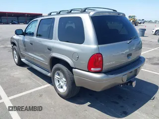 2001 Dodge Durango z VIN 1B4HS28ZX1F520696, wystawiony jako IAAI lot #42505170 z przebiegiem 72 299 mil mil oraz . Historia ofert i sprzedaży dostępna na DreamBid. Obrazek 3.