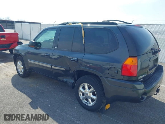 2005 GMC Envoy SLE with VIN 1GKDT13S052299632, listed as a IAAI auction lot 41966628 with 199,312 mi miles and . Bid and sale history available at DreamBid. Image 3.