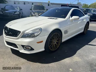 2012 Mercedes-Benz SL-Class SL 550 with VIN WDBSK7BA5CF168279, listed as a IAAI auction lot 42070913 with 130,820 mi miles. Bid and sale history available at carsss.com. Image 2.