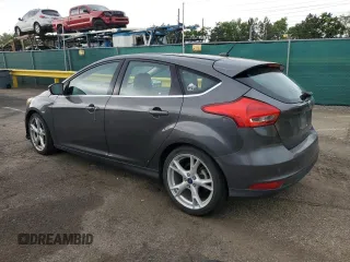 2016 Ford Focus Titanium z VIN 1FADP3N27GL329026, wystawiony jako Copart lot #60910475 z przebiegiem 98 794 mil mil oraz Szkoda całkowita • Salvage title. Historia ofert i sprzedaży dostępna na DreamBid. Obrazek 2.