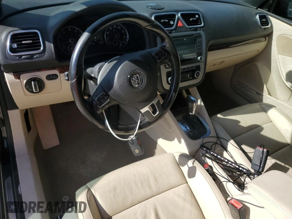 2012 Volkswagen Eos Lux with VIN WVWFW7AH7CV016872, listed as a Copart auction lot 52591415 with 121,130 mi miles and Salvage Title. Bid and sale history available at DreamBid. Image 8.
