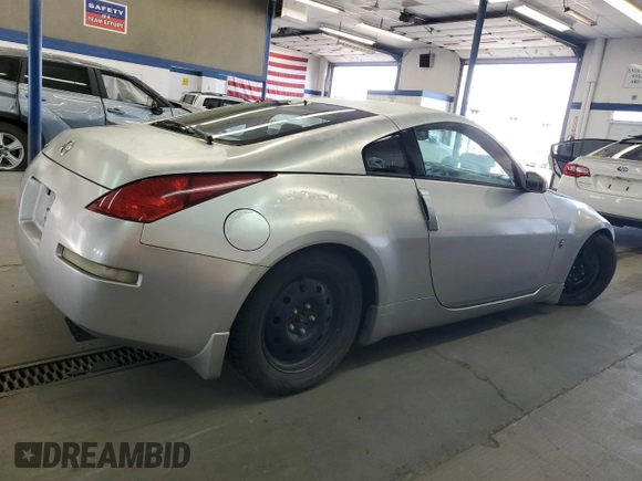 2003 Nissan 350Z Touring с VIN JN1AZ34D03T114076, выставлен на аукционе Copart как лот 61078255 с пробегом 187 952 миль миль и Списание • Salvage title. История ставок и продаж доступна на DreamBid. Изображение 3.