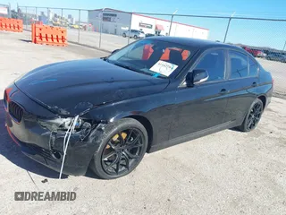 2015 BMW 3 Series 328i with VIN WBA3A5C58FF609161, listed as a IAAI auction lot 41162704 with 117,190 mi miles. Bid and sale history available at carsss.com. Image 2.