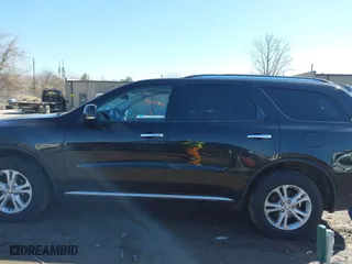 2013 Dodge Durango Crew with VIN 1C4RDJDG6DC540482, listed as a IAAI auction lot 41813209 with 140,875 mi miles. Bid and sale history available at carsss.com. Image 14.