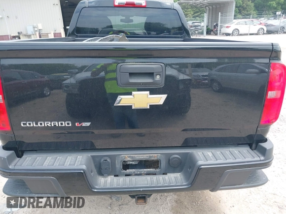 2019 Chevrolet Colorado 4WD Work Truck with VIN 1GCGTBEN5K1129922, listed as a IAAI auction lot 42476965 with 84,057 mi miles and . Bid and sale history available at DreamBid. Image 16.
