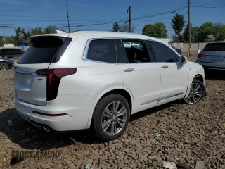 2020 Cadillac XT6 AWD Premium Luxury z VIN 1GYKPDRS3LZ137783, wystawiony jako Copart lot #54179175 z przebiegiem 30 447 mil mil oraz Szkody całkowita. Historia ofert i sprzedaży dostępna na DreamBid. Obrazek 3.
