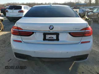 2017 BMW 7 Series 750i with VIN WBA7F0C51HGM21052, listed as a Copart auction lot 46299535 with 85,765 mi miles and Clean Title. Bid and sale history available at carsss.com. Image 6.