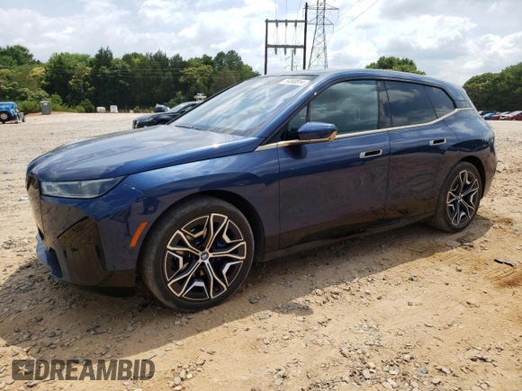 2023 BMW iX M60 with VIN WB533CF06PCK59741, listed as a Copart auction lot 59393814 with 24,005 mi miles and Salvage Title. Bid and sale history available at carsss.com. Image 1.