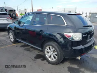 2009 Mazda CX-7 Grand Touring with VIN JM3ER29L990234727, listed as a IAAI auction lot 41272921 with 173,753 mi miles. Bid and sale history available at carsss.com. Image 3.