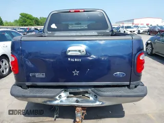 2003 Ford F-150 XLT with VIN 1FTRW07L33KC83234, listed as a IAAI auction lot 41894573 with 215,232 mi miles. Bid and sale history available at carsss.com. Image 16.