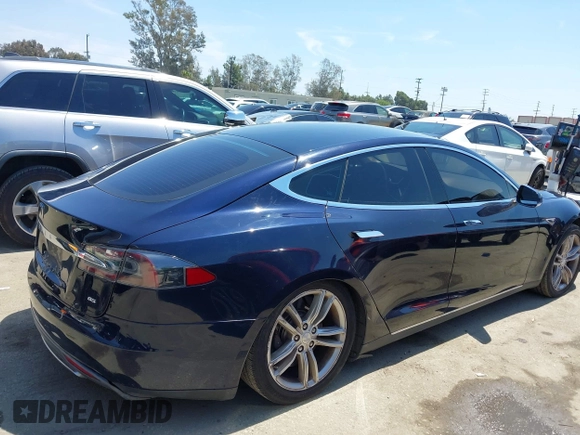 2013 Tesla Model S with VIN 5YJSA1DN1DFP05317, listed as a IAAI auction lot 42086998 with 150,964 mi miles. Bid and sale history available at carsss.com. Image 4.