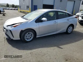 2021 Toyota Prius L Eco with VIN JTDKAMFUXM3130587, listed as a Copart auction lot 53167245 with 11,560 mi miles and Salvage title. Bid and sale history available at DreamBid. Image 1.