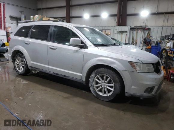 2013 Dodge Journey SXT with VIN 3C4PDCBB1DT558323, listed as a Copart auction lot 45953885 with 165,781 mi miles and Salvage Title. Bid and sale history available at DreamBid. Image 4.