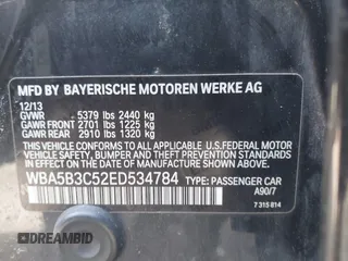 2014 BMW 5 Series 535i xDrive with VIN WBA5B3C52ED534784, listed as a IAAI auction lot 41875567 with 128,533 mi miles and . Bid and sale history available at carsss.com. Image 9.