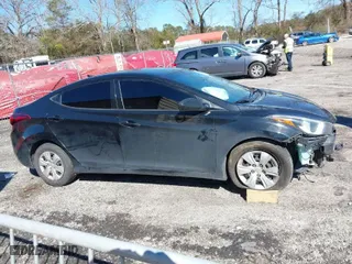 2016 Hyundai Elantra SE with VIN 5NPDH4AE4GH756150, listed as a IAAI auction lot 41600344 with 119,367 mi miles. Bid and sale history available at carsss.com. Image 14.