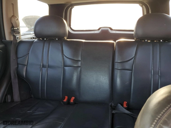 2002 Jeep Grand Cherokee Laredo with VIN 1J4GW48N32C180185, listed as a Copart auction lot 51988335 with 212,399 mi miles and Salvage Title. Bid and sale history available at carsss.com. Image 12.