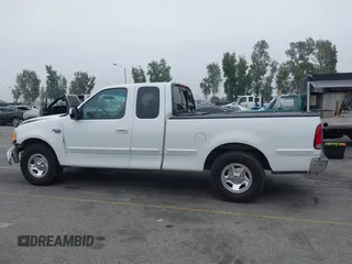 2000 Ford F-150 XL with VIN 1FTRX17L4YNA39407, listed as a IAAI auction lot 42141350 with 82,824 mi miles and . Bid and sale history available at DreamBid. Image 14.