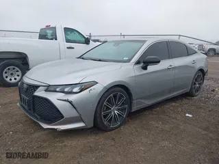 2019 Toyota Avalon XLE with VIN 4T1BZ1FB8KU006035, listed as a IAAI auction lot 41591179 with 111,917 mi miles. Bid and sale history available at carsss.com. Image 2.