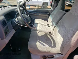 1999 Ford F-350 XL with VIN 1FTSW31S2XEE89071, listed as a Copart auction lot 61016685 with 115,130 mi miles and Salvage title. Bid and sale history available at DreamBid. Image 7.