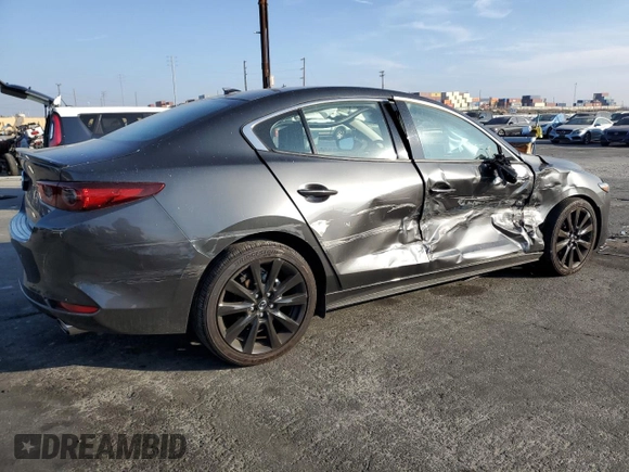 2023 Mazda 3 Premium Plus with VIN 3MZBPBEY2PM377464, listed as a Copart auction lot 83273744 with 6,299 mi miles and Salvage Title. Bid and sale history available at DreamBid. Image 2.