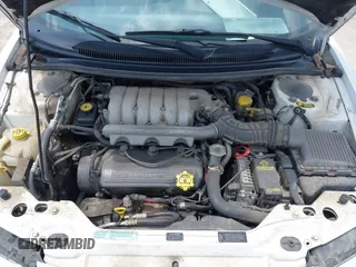 1997 Chrysler Sebring JX z VIN 3C3EL45H4VT624613, wystawiony jako IAAI lot #42262828 z przebiegiem Nie podano mil oraz . Historia ofert i sprzedaży dostępna na DreamBid. Obrazek 10.