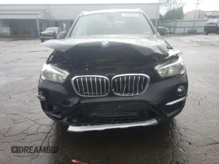 2018 BMW X1 xDrive28i with VIN WBXHT3C35J3H30946, listed as a Copart auction lot 55927505 with 69,626 mi miles and Salvage title. Bid and sale history available at DreamBid. Image 5.